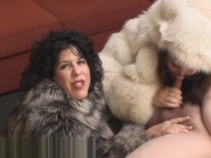 Two chubby milfs in fox fur coats suck cock